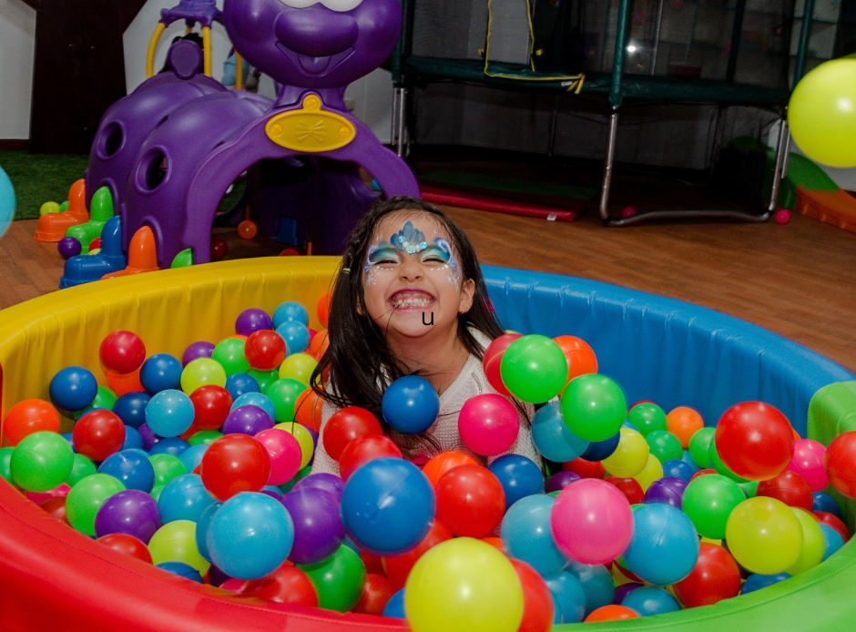playing at an indoor playground