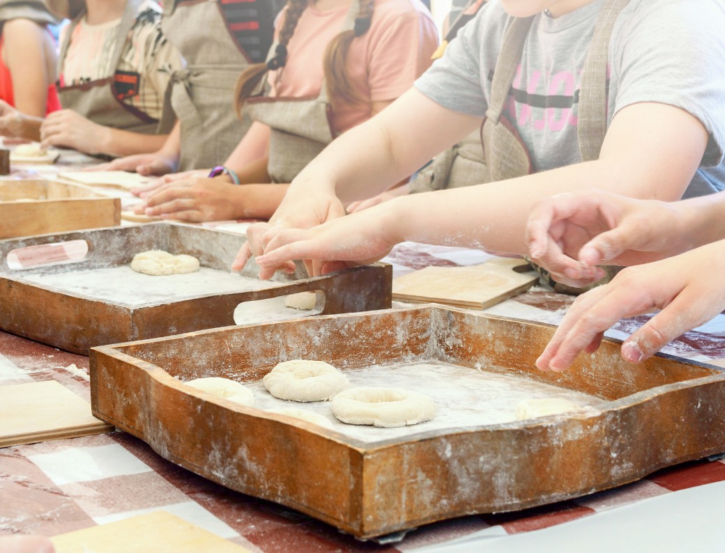 making doughnuts in a cooking class